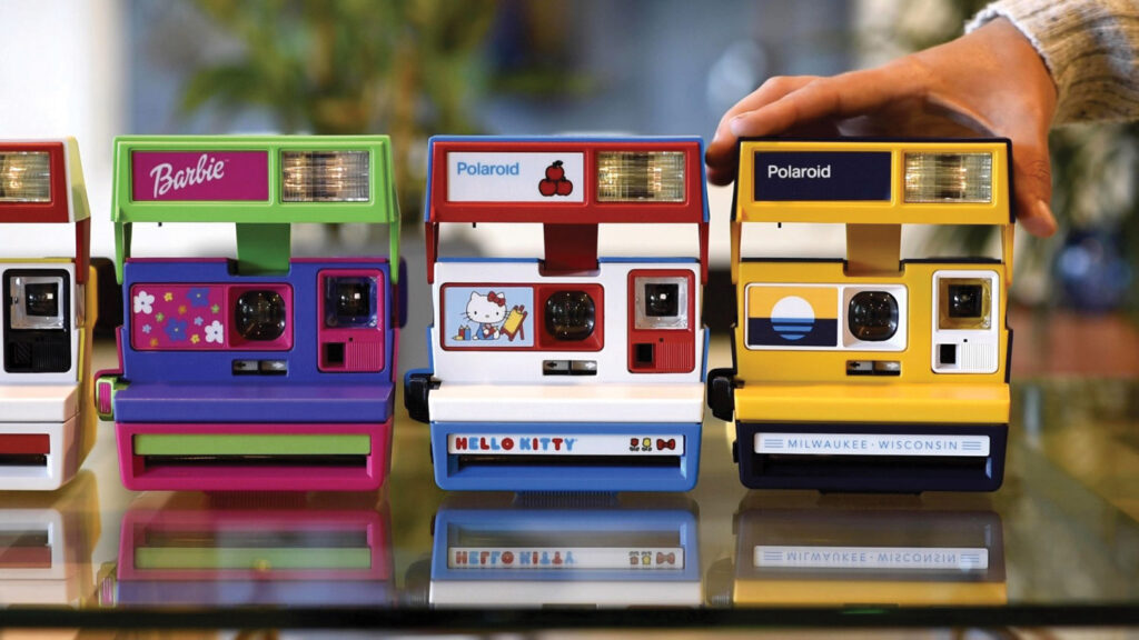 A row of colorful retro Polaroid camera set up by Retrospekt in Milwaukee.