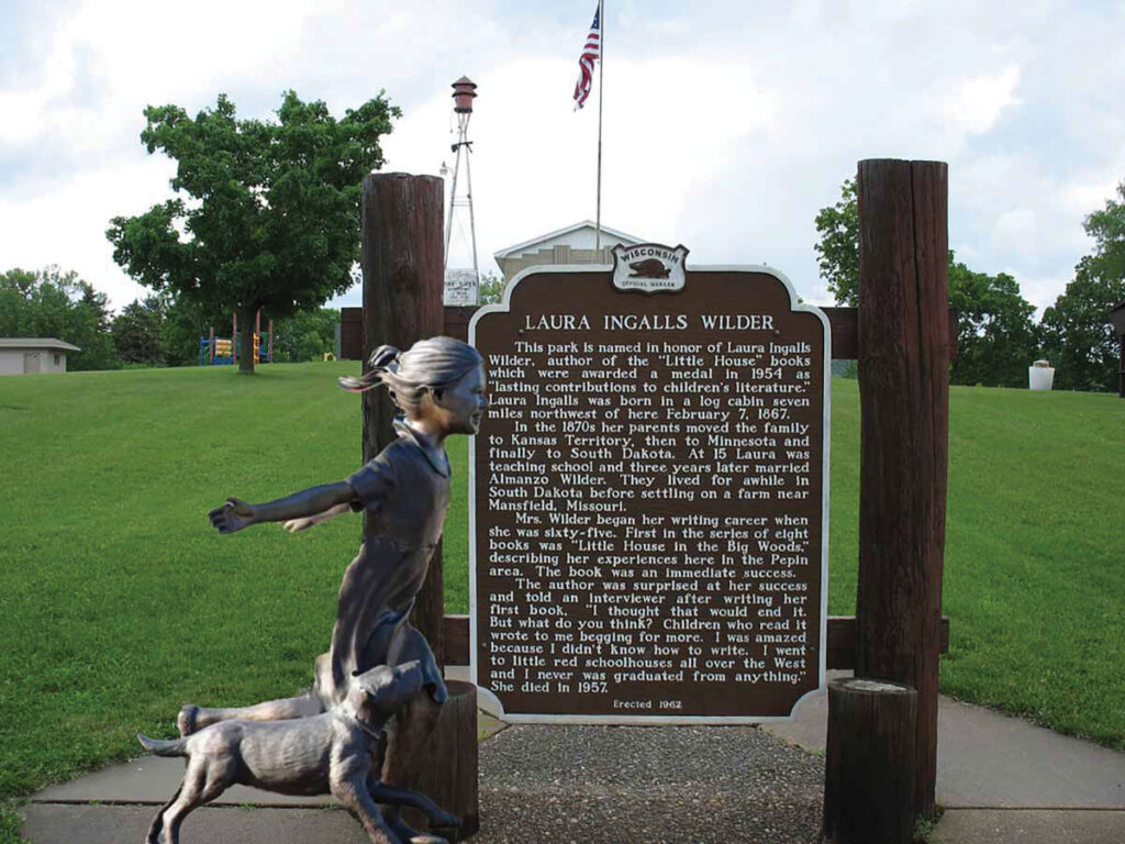 A marker details the biography of Laura Ingalls Wilder at the Laura Ingalls Museum in Pepin, Wisconsin.