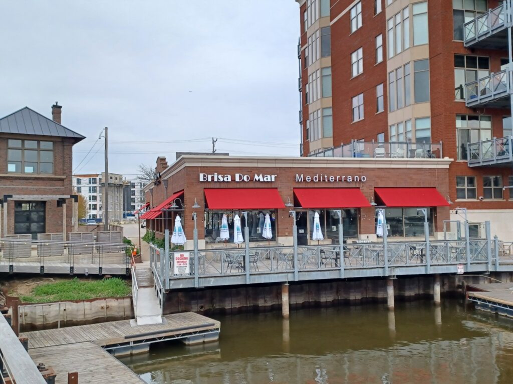 Exterior of Brisa Do Mar, a new restaurants in the Third Ward. The building is next to the river.
