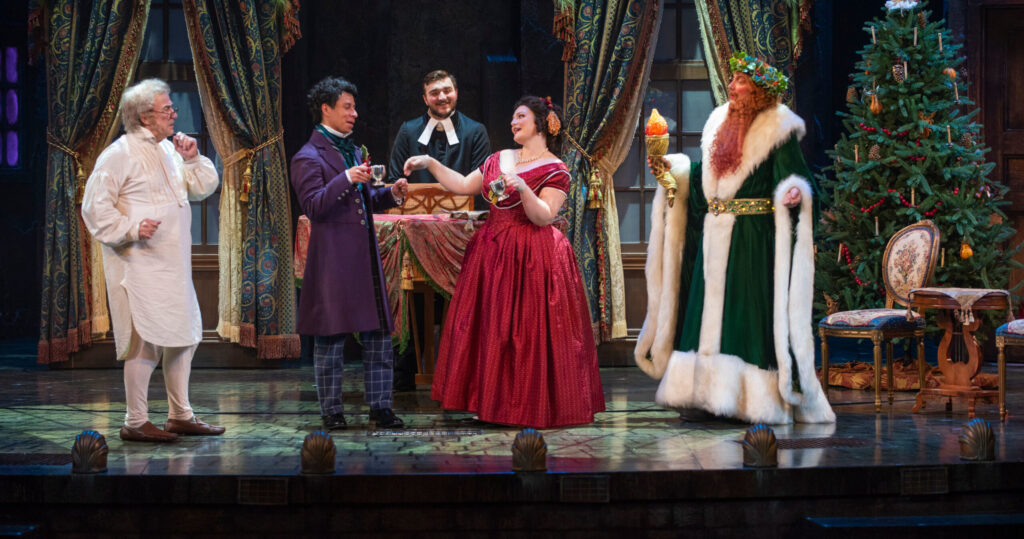 Actors on stage for a performance of 'A Christmas Carol'