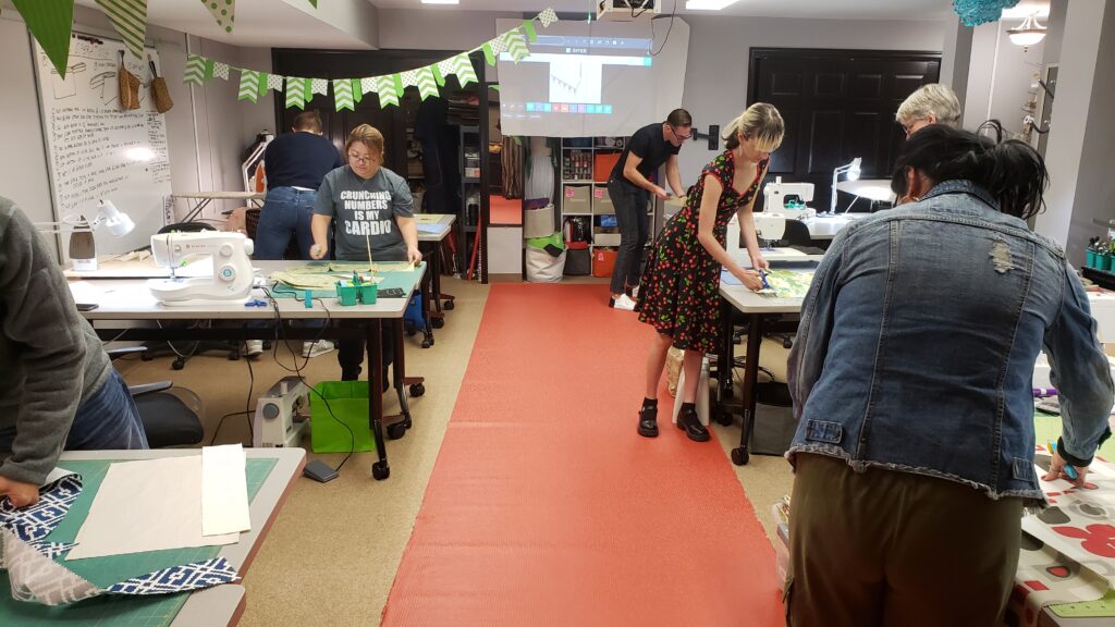 An image showing a sewing class at Madam Chino's