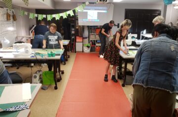 An image showing a sewing class at Madam Chino's