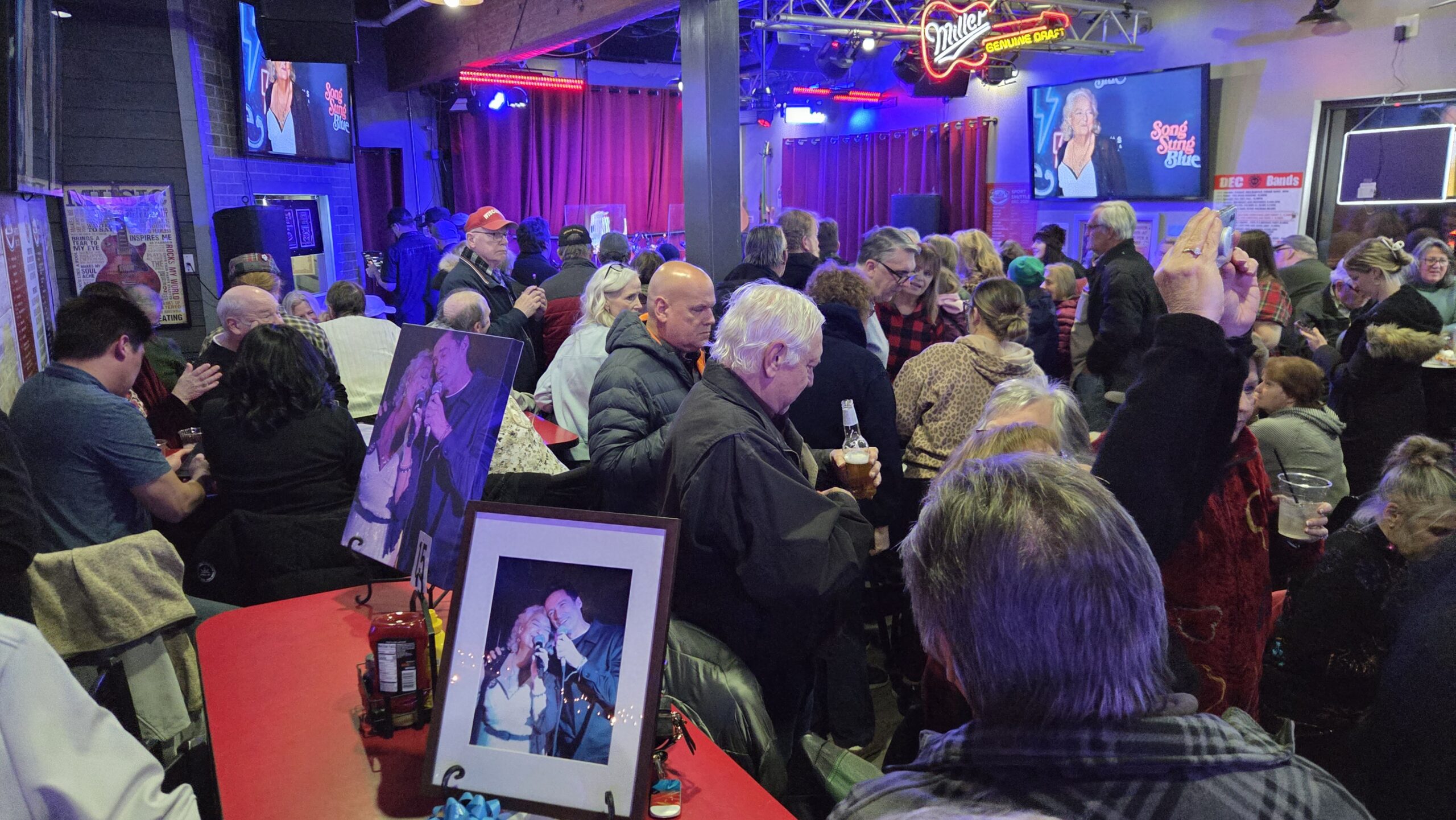 The audience waits at Paulie's Pub for Claire Sardina to perform.