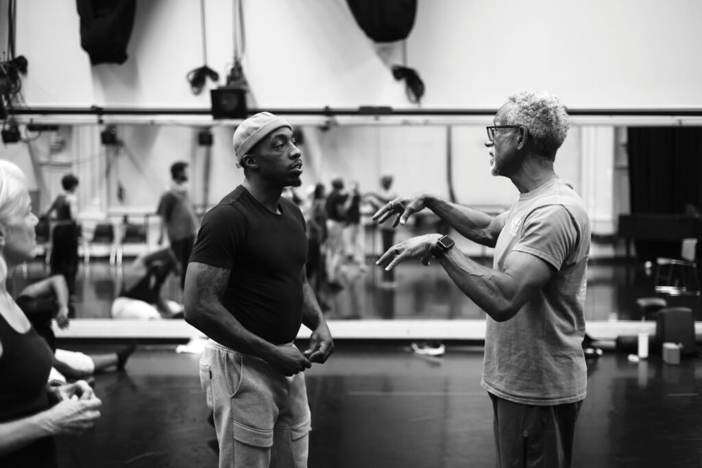 Photo of David Rousseve and Richard Brasfield preparing for "Care"