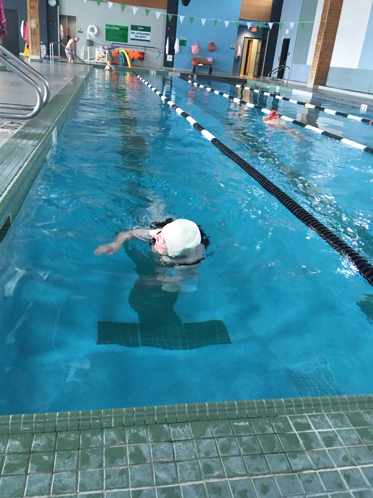 100-year-old Jean Toepfer swims in the pool at Innovate Health & Fitness in Franklin.