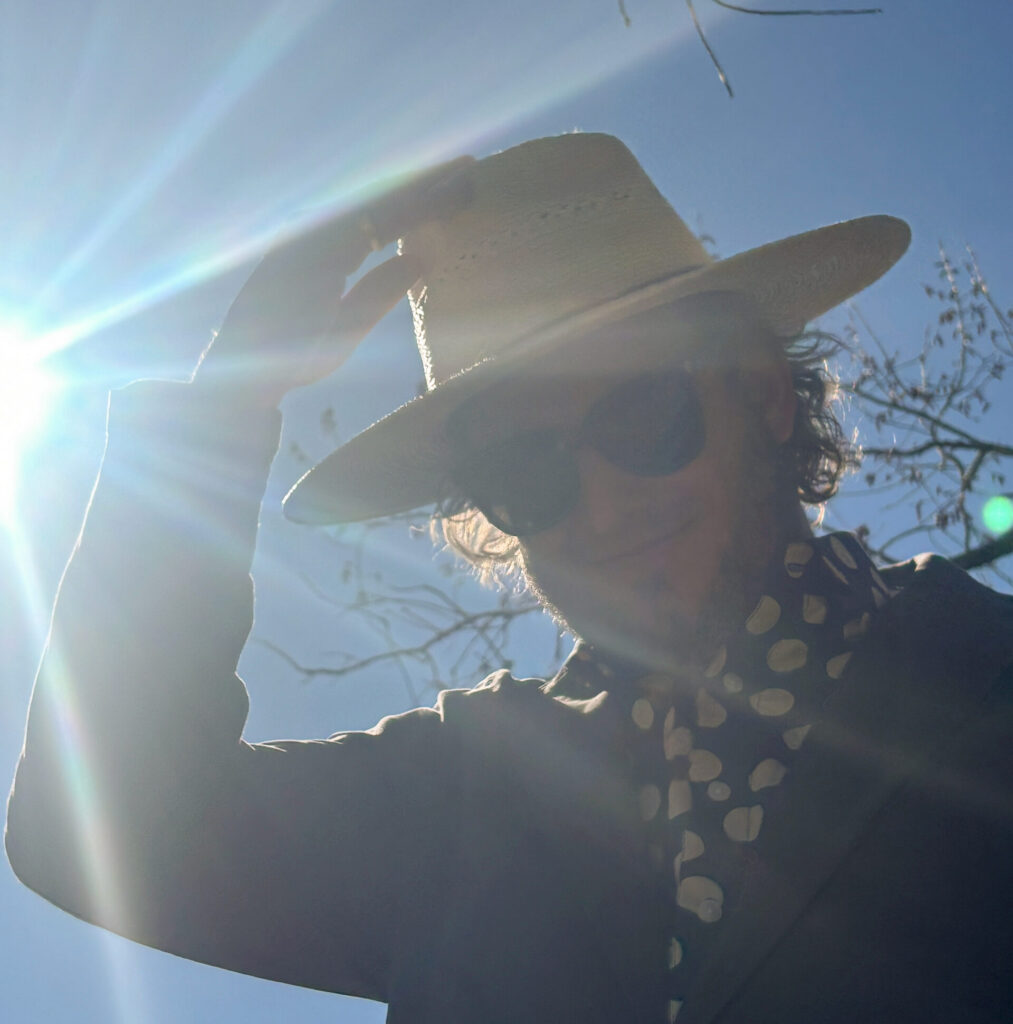 Justin Vernon of Bon Iver tipping his hat "Nashville Skyline" style; Photo by Asher Weisberg, courtesy of Eaux Claires Festival