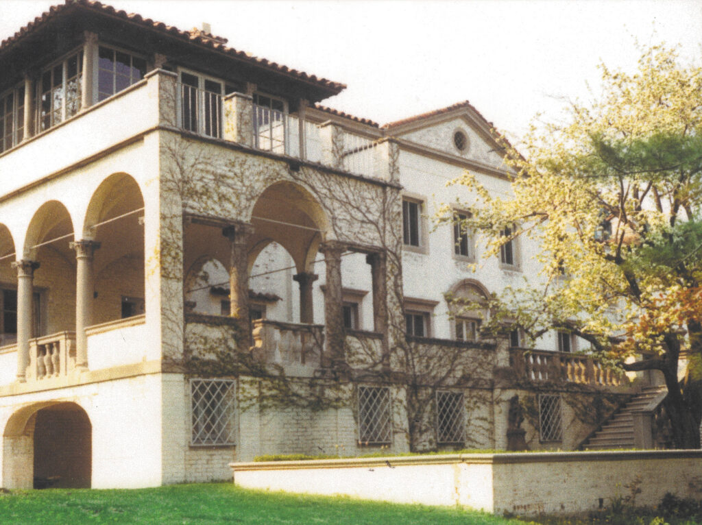 Vintage photo of Villa Terrace overgrown with brush.