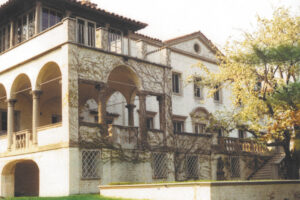 Vintage photo of Villa Terrace overgrown with brush.