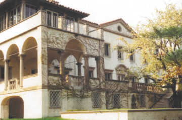 Vintage photo of Villa Terrace overgrown with brush.