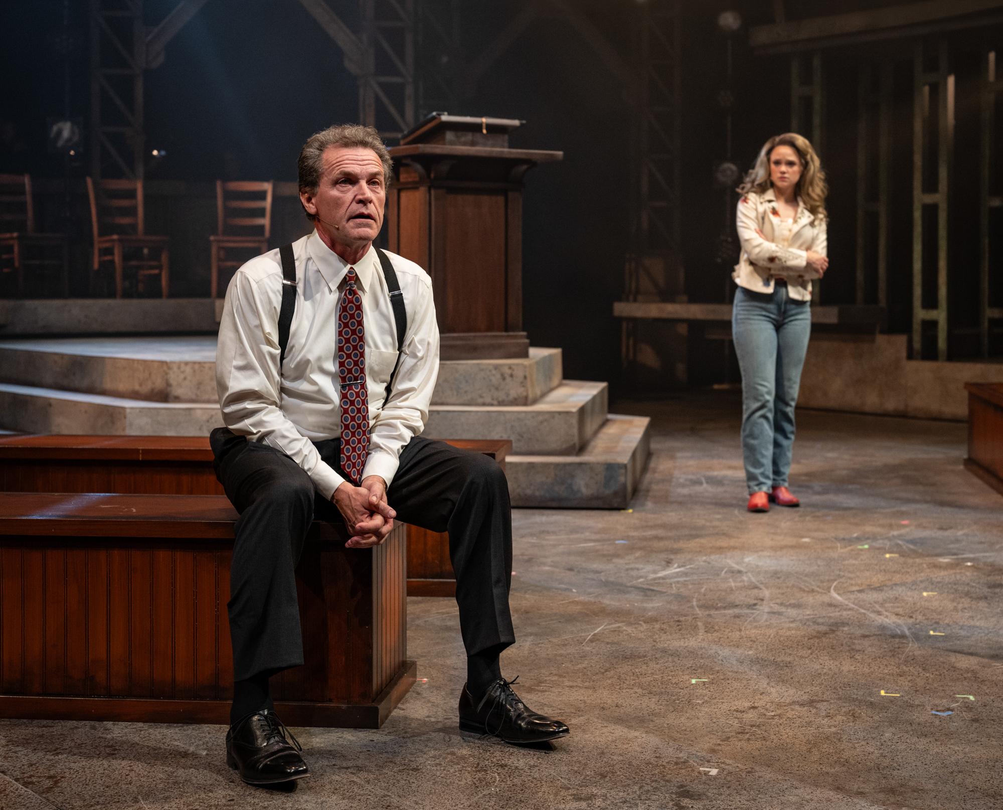 Steven Koehler and Maddie Roberts talk solemnly during a production of Footloose at the Milwaukee Rep.